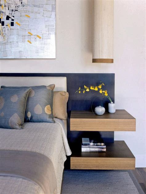 bedhead with floating side tables.